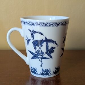 Blue And White Coffee Mug With Birds And Plants